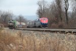 Amtrak 108 heads east at MP 116 while NS 9440 sits on the siding